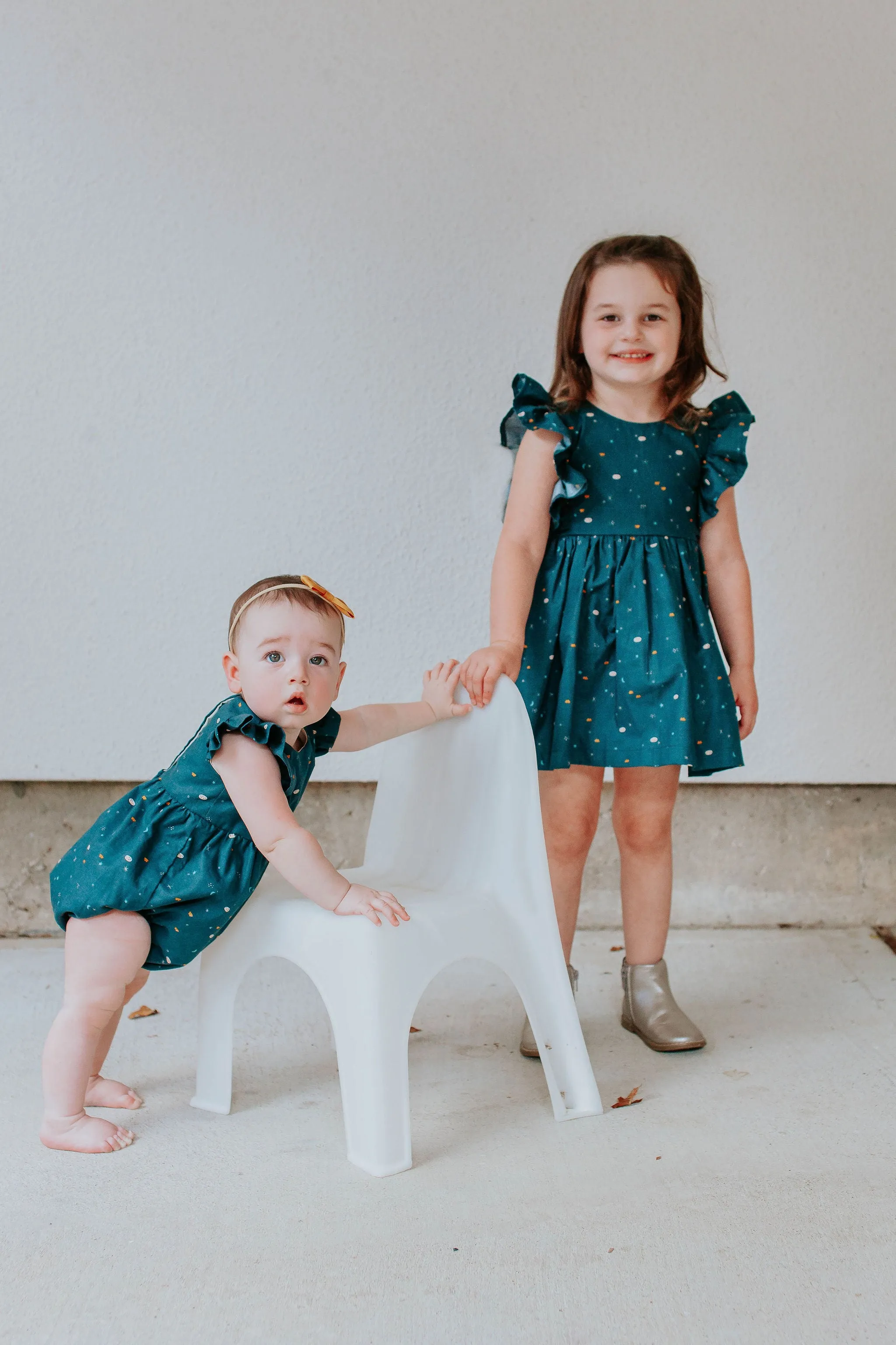 Little Girl's Navy Stargazing Print Ruffle Pinafore Cotton Dress